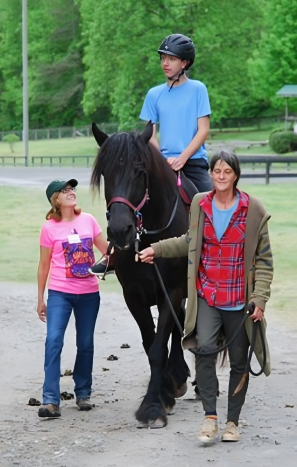 Horseback riding lesson outdoors