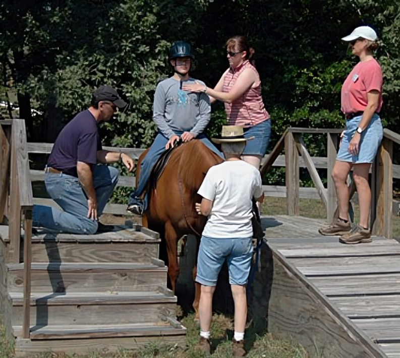Horseback riding lesson with group support