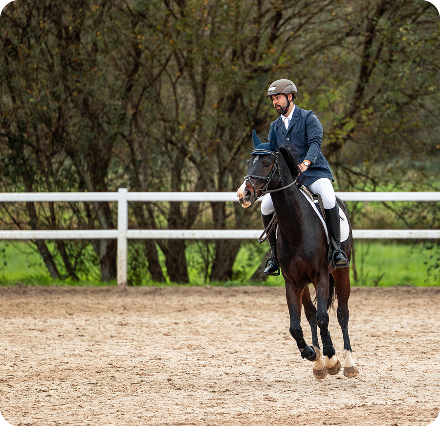 Man horseback riding in equestrian event