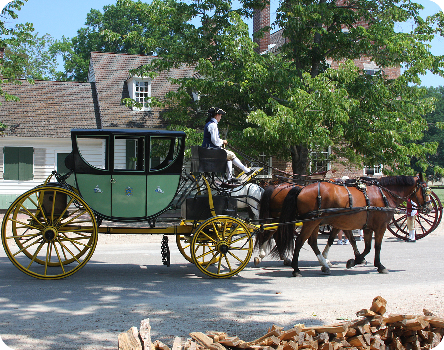 Vintage carriage with horses in town
