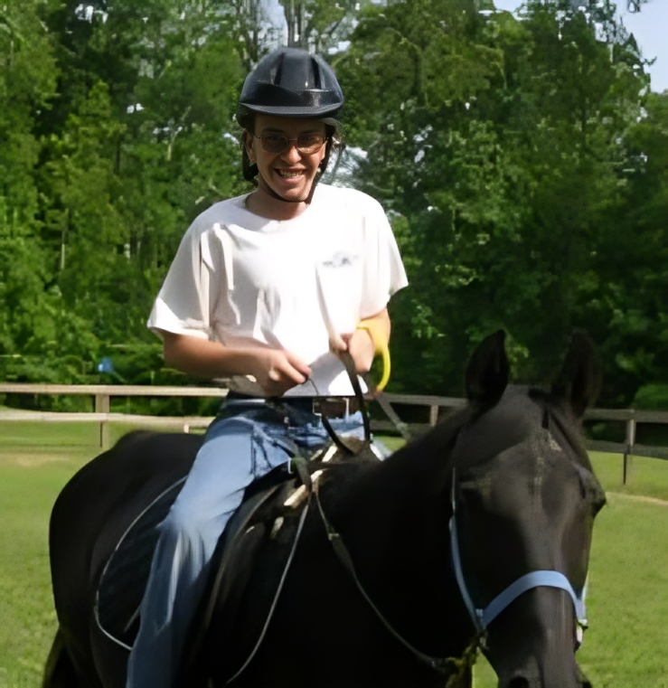 Horseback riding in a sunny park