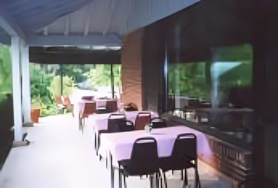 Outdoor dining area with covered tables