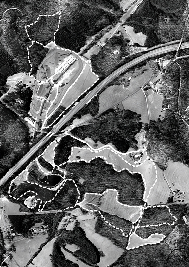 Aerial view of landscape with dotted lines.